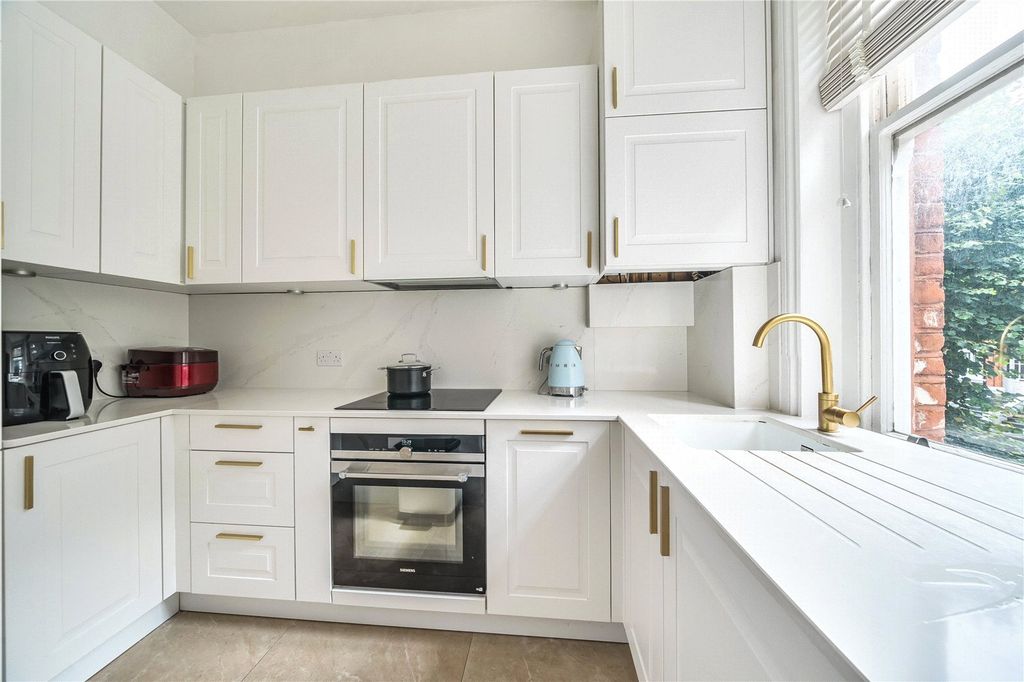 Property photo 3 of 16 Kitchen