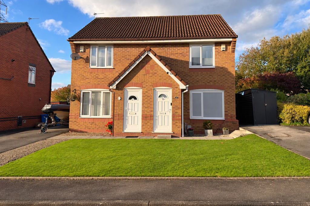 Property photo 1 of 12 Front (Exterior)
