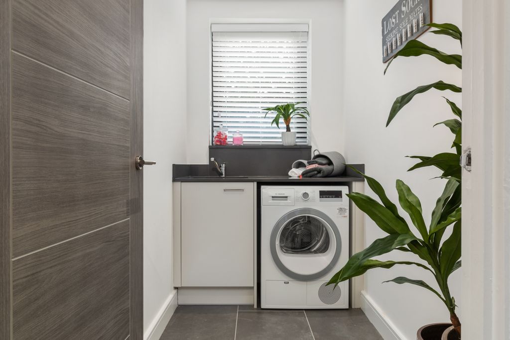 Property photo 2 of 12 Utility Room