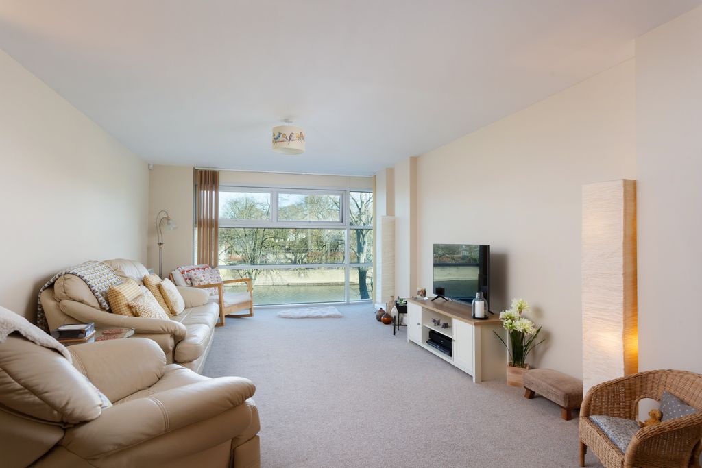 Property photo 3 of 11 Living Area
