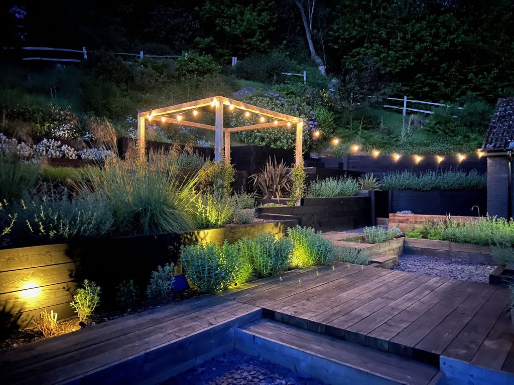 Property photo 2 of 28 Garden By Night
