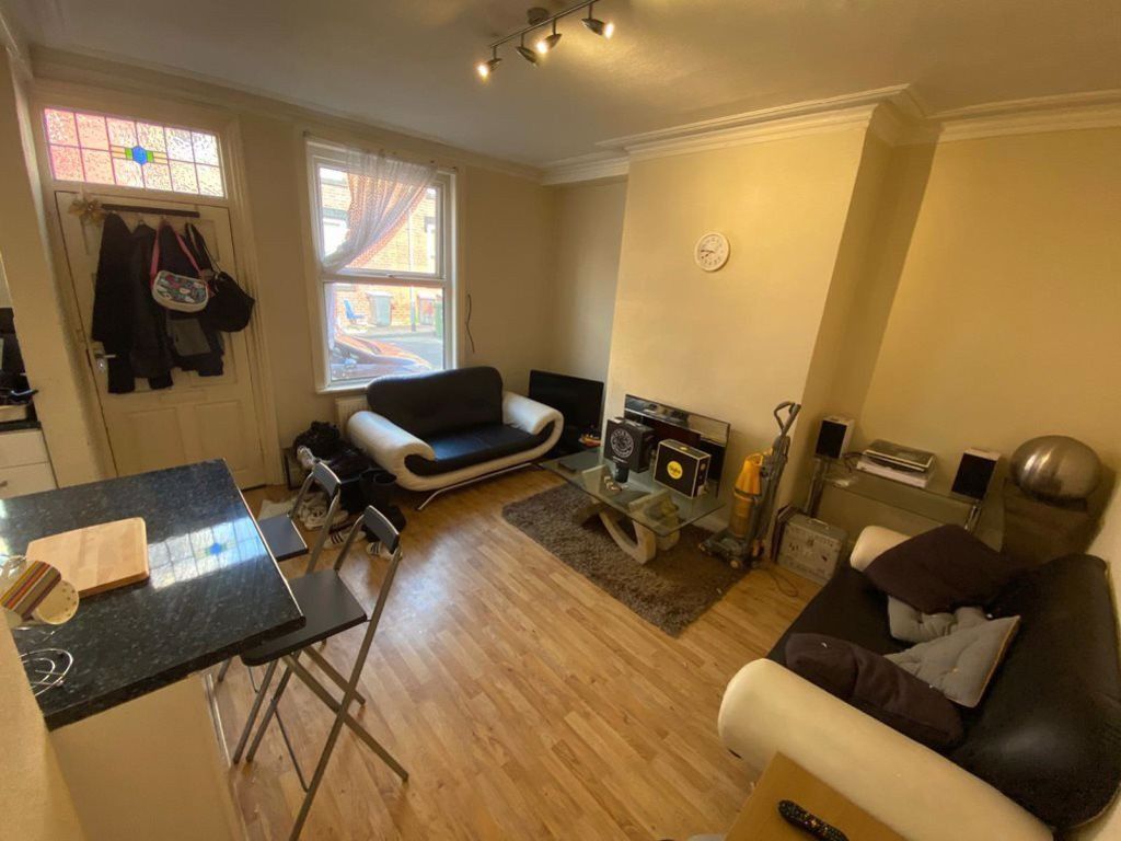 Property photo 2 of 10 A Bright And Inviting Living Room Featuring Two Co...