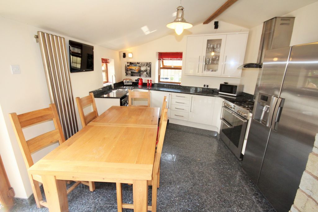Property photo 2 of 12 Kitchen