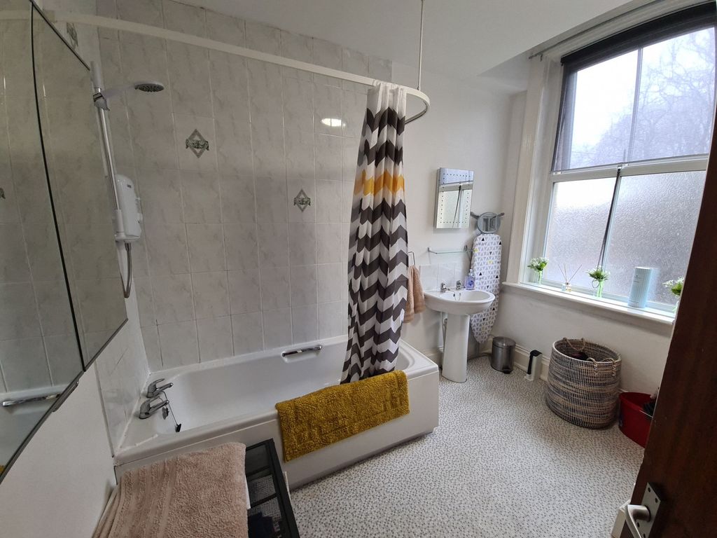 Property photo 1 of 11 Bright, Well-Kept Bathroom Featuring A Bathtub Wit...