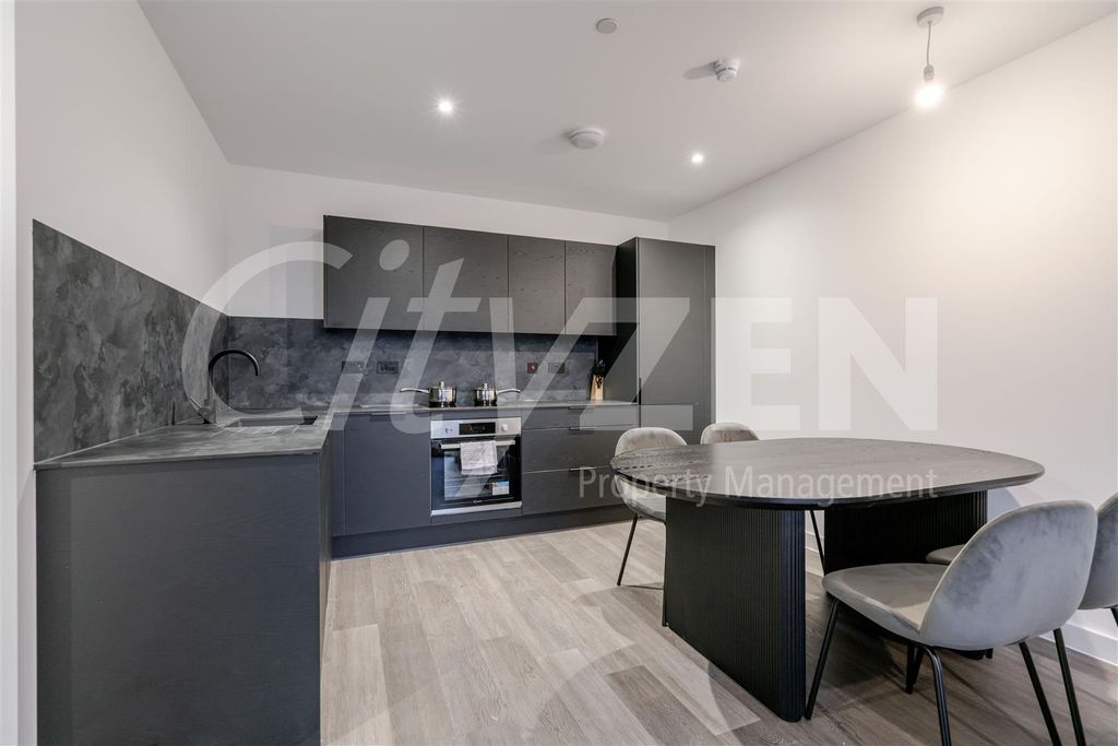 Property photo 2 of 16 Dining Area/Kitchen