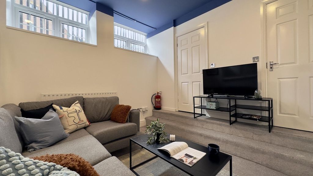 Property photo 1 of 9 A Spacious And Inviting Large Modern Living Room, ...