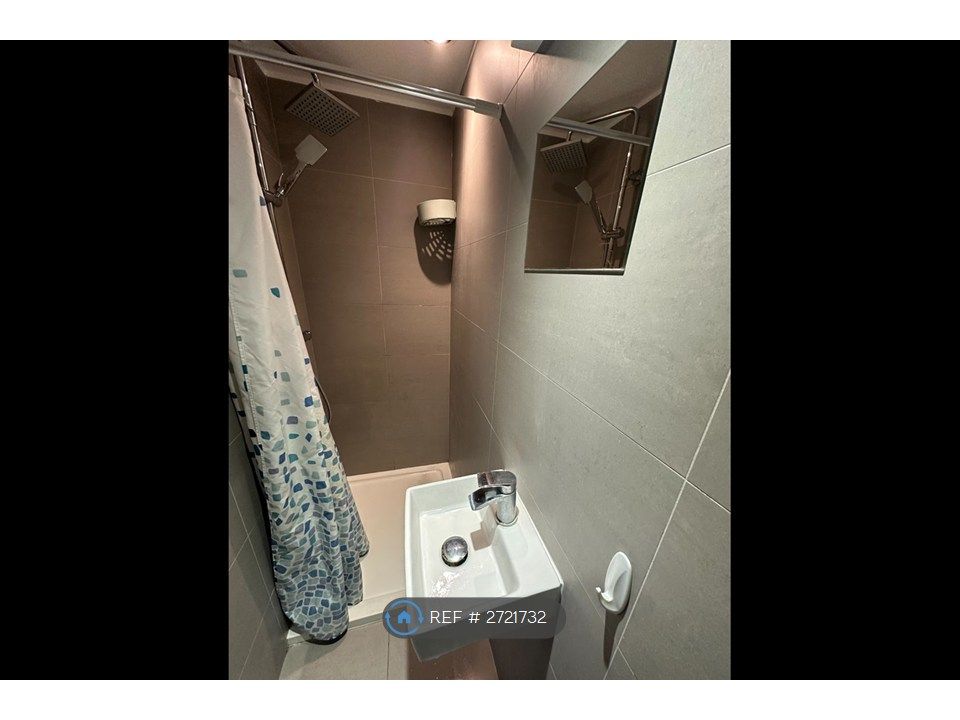 Property photo 3 of 13 Downstairs Bathroom: Shower