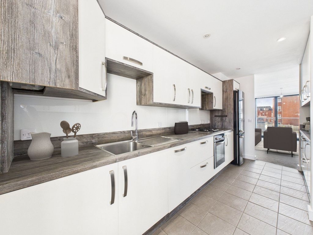 Property photo 3 of 12 Kitchen