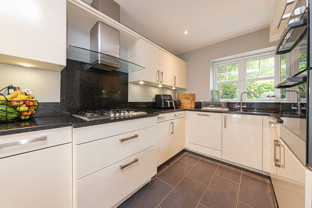 Property photo 3 of 17 Kitchen Area