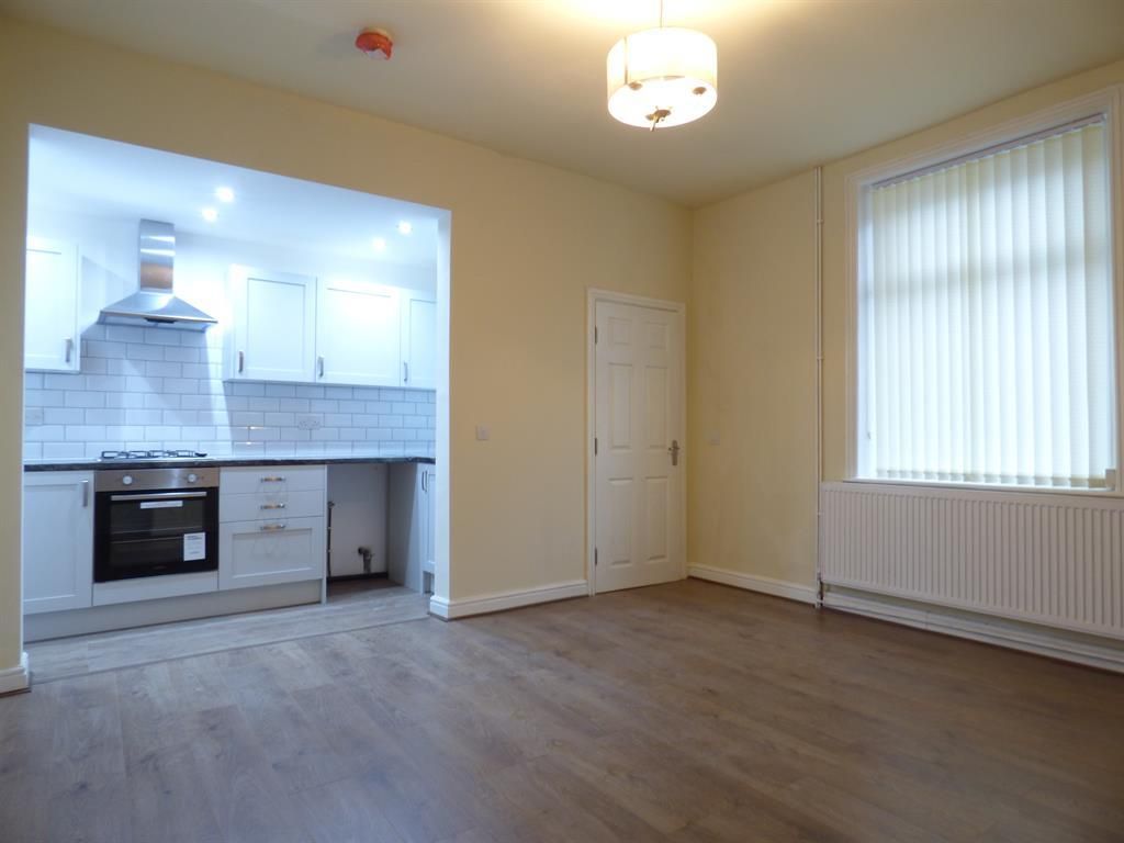 Property photo 1 of 10 Living Area
