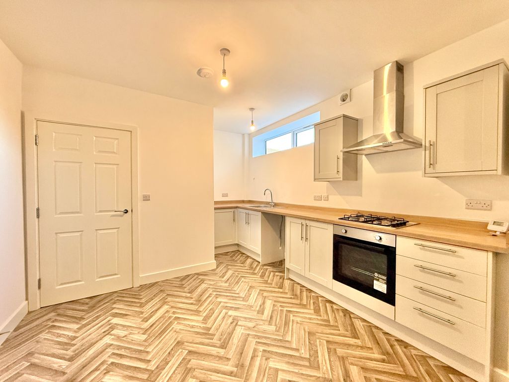 Property photo 1 of 6 Kitchen Area