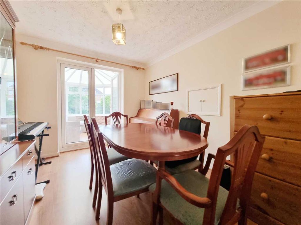 Property photo 3 of 11 Dining Room: