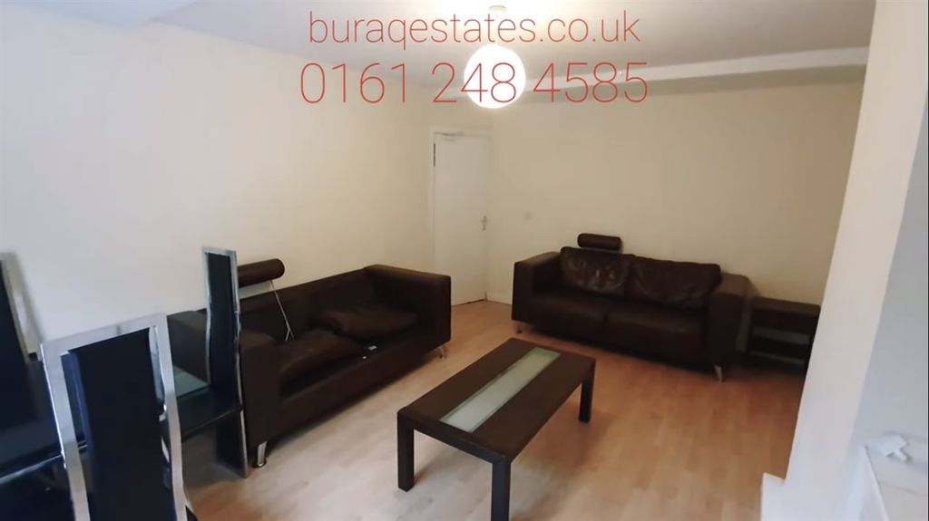 Property photo 2 of 12 Bright, Simply Furnished Living Room With Two Blac...