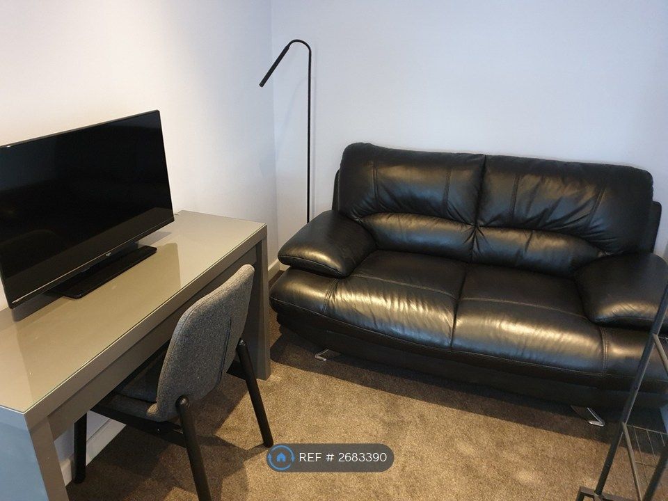 Property photo 3 of 14 Room 3 With A Sofa