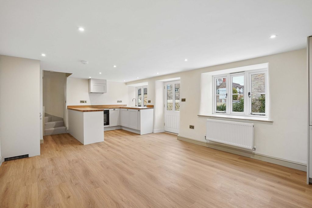 Property photo 3 of 11 Kitchen/Dining/Living Room