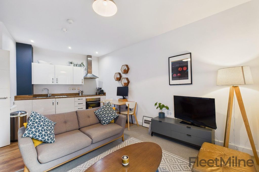 Property photo 3 of 12 Living/Dining Area