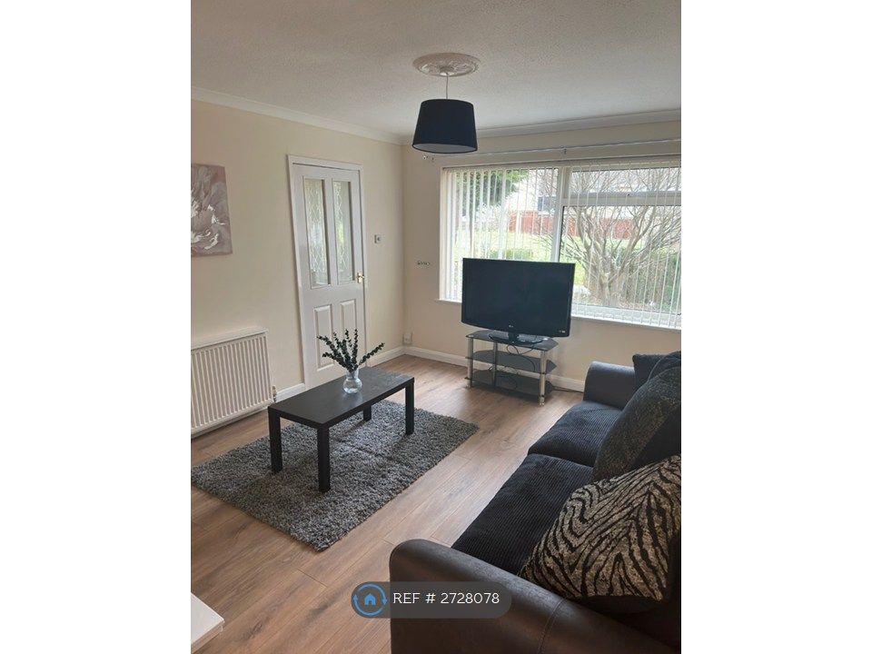 Property photo 2 of 12 Living Area