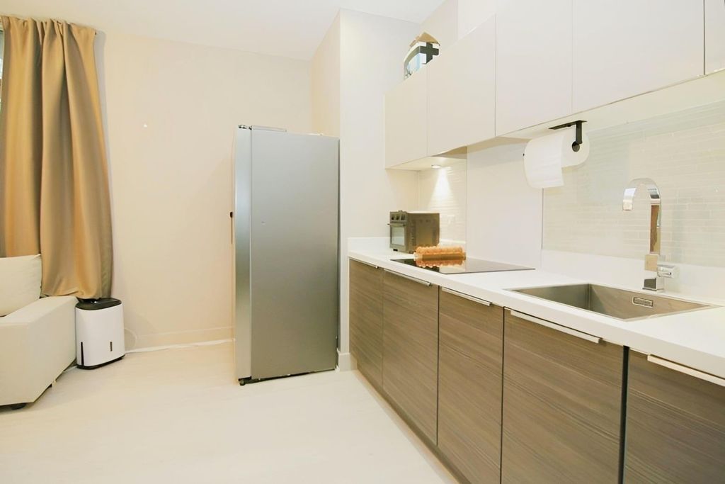 Property photo 3 of 13 Kitchen