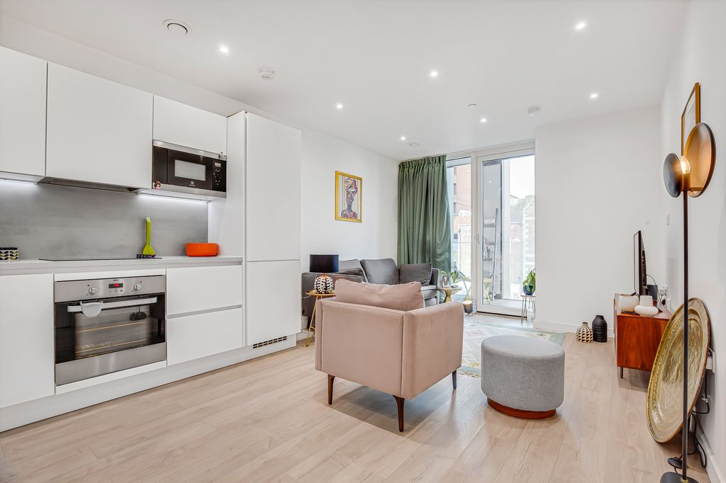 Property photo 1 of 12 Kitchen & Living Room.Jpg