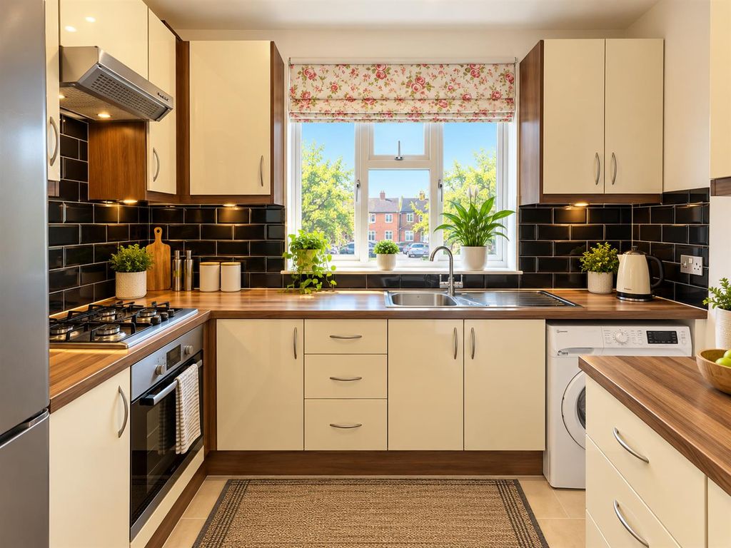 Property photo 3 of 8 Warm Modern U-Shaped Kitchen Interior (1).Png