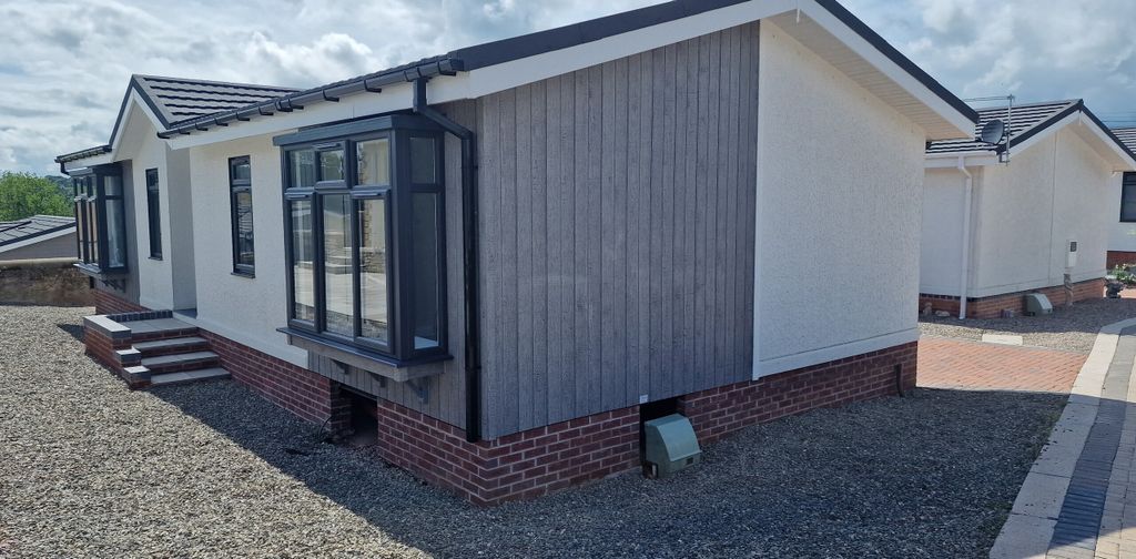 Property photo 1 of 14 New Exterior Side