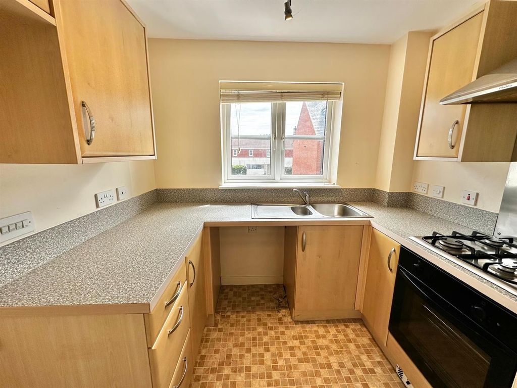 Property photo 2 of 12 Kitchen