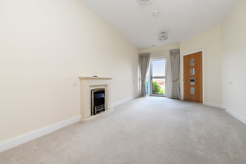Property photo 2 of 17 A Living Room With A Fireplace