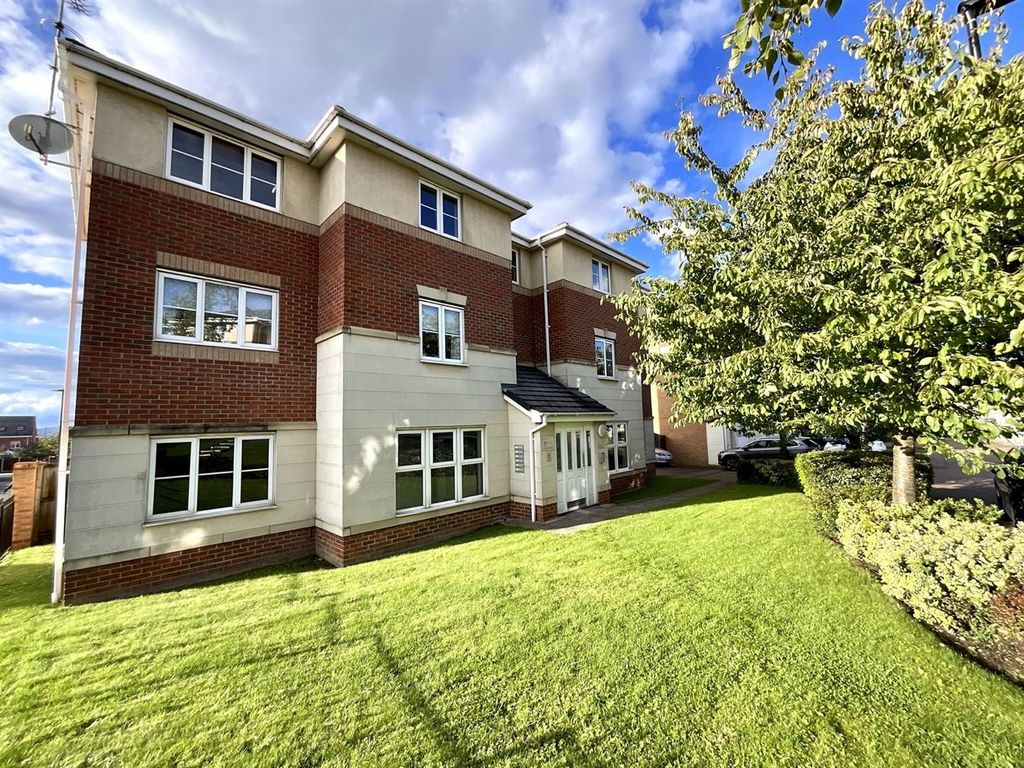 Property photo 1 of 12 Modern Brick Building With A Lush Green Lawn...