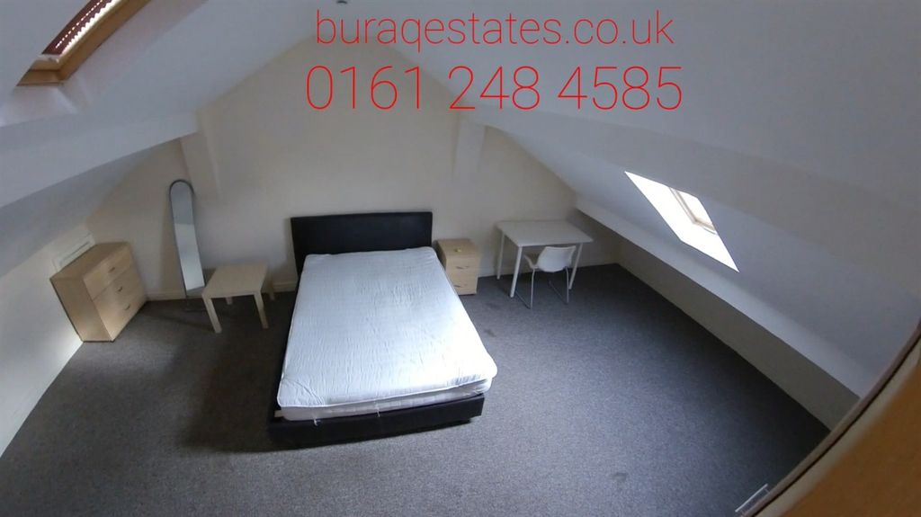 Property photo 3 of 15 Bright And Spacious Master Bedroom Featuring A Com...