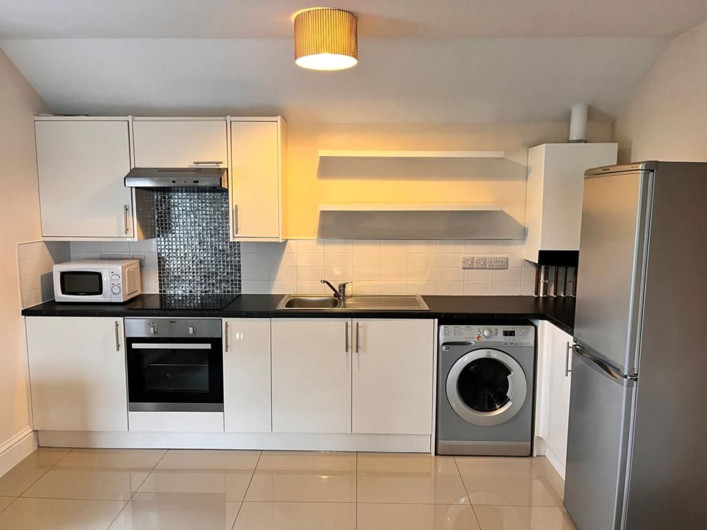 Property photo 3 of 7 Kitchen