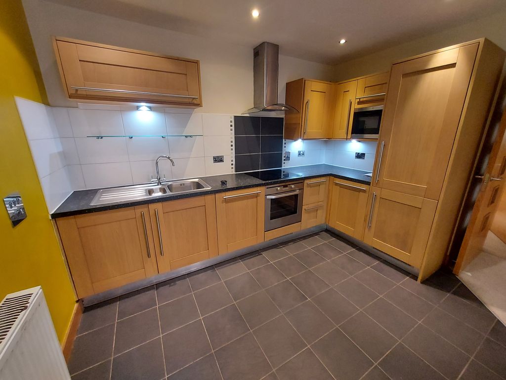 Property photo 3 of 7 Kitchen