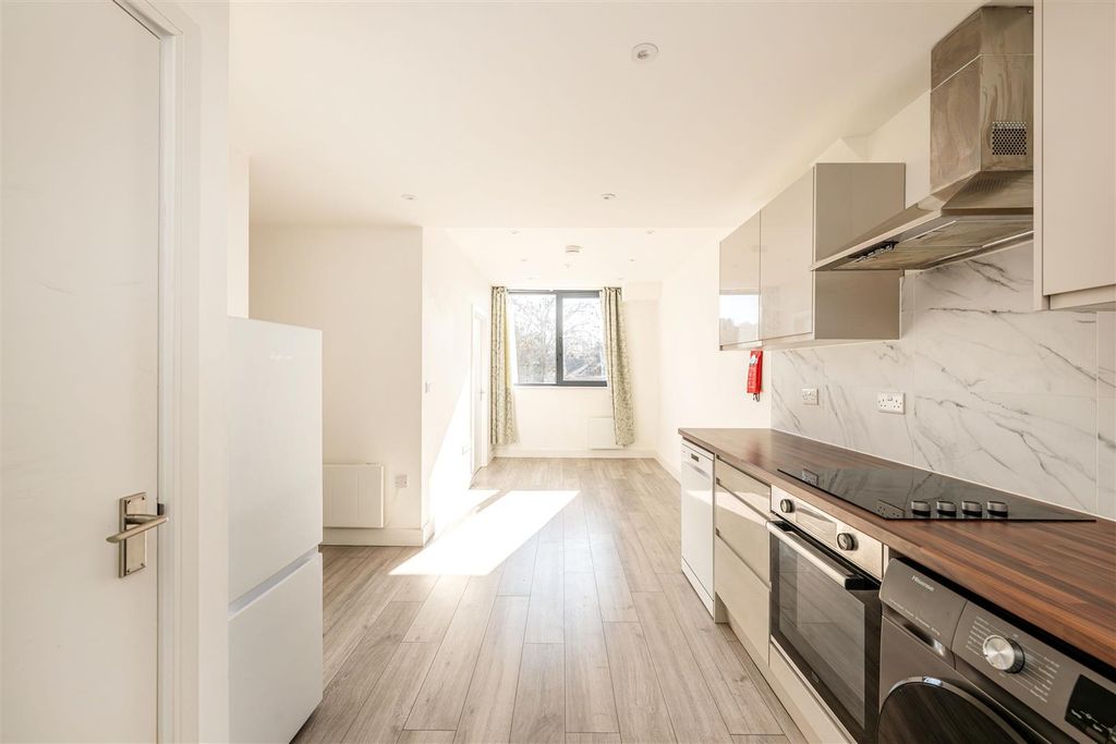 Property photo 2 of 8 Kitchen/Living Room