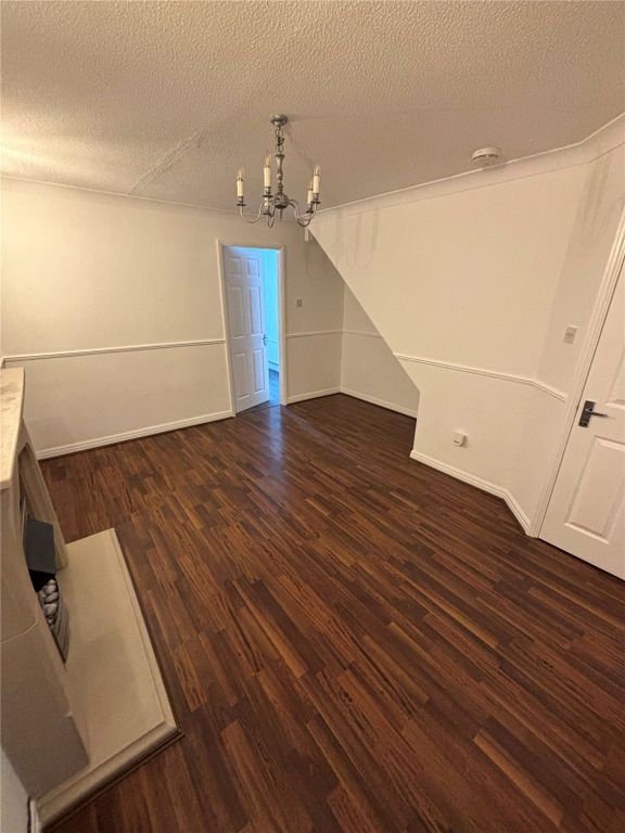 Property photo 3 of 12 Living Area