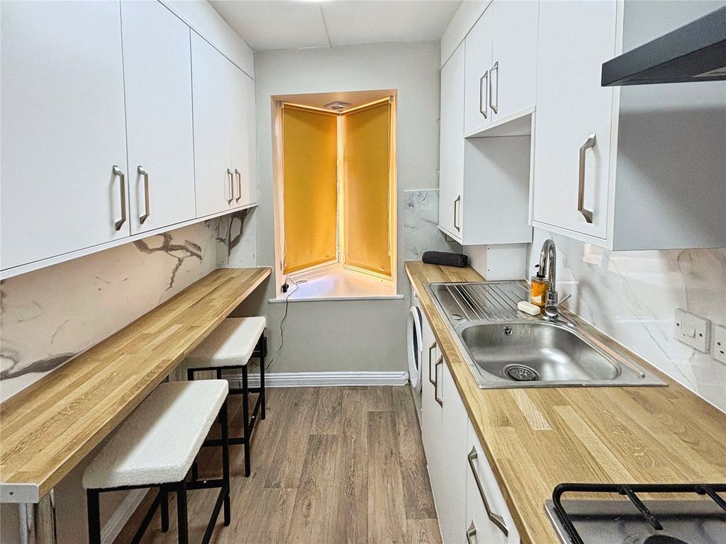 Property photo 3 of 12 Kitchen