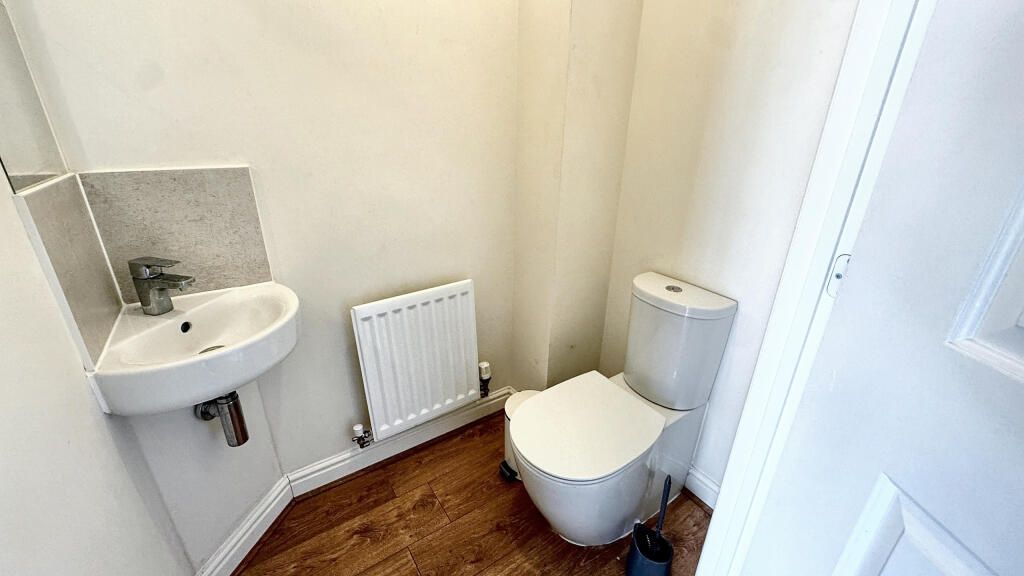 Property photo 1 of 6 A Compact And Clean Single Toilet Room Featuring A...