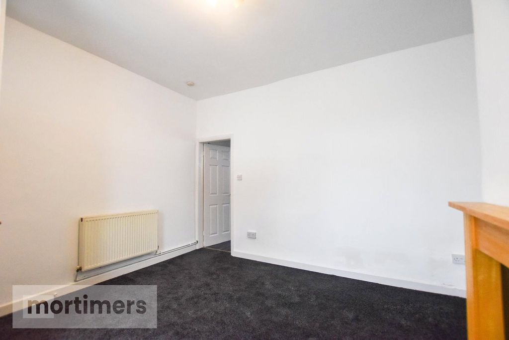 Property photo 3 of 8 Living Room