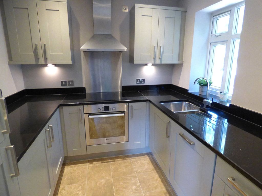 Property photo 2 of 11 Kitchen