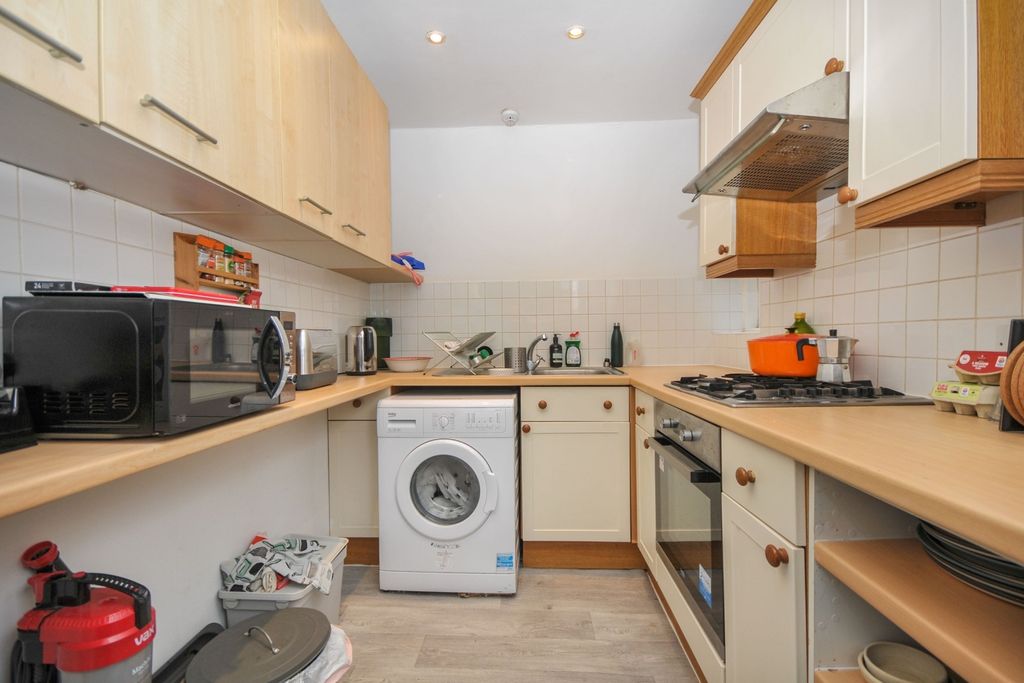Property photo 3 of 10 Kitchen Area