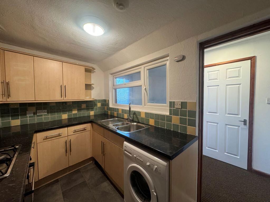 Property photo 3 of 13 Kitchen