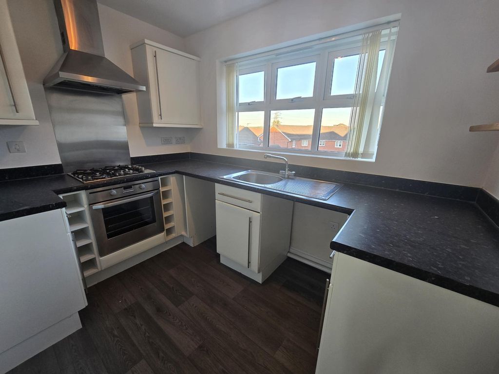 Property photo 3 of 8 Kitchen