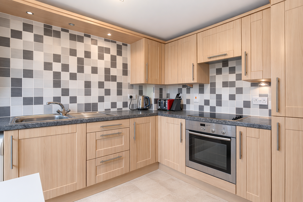 Property photo 2 of 16 Modern Kitchen With Clean Finishes