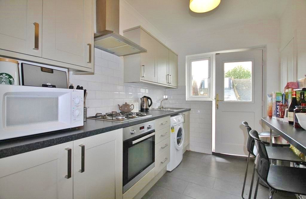 Property photo 3 of 7 Kitchen