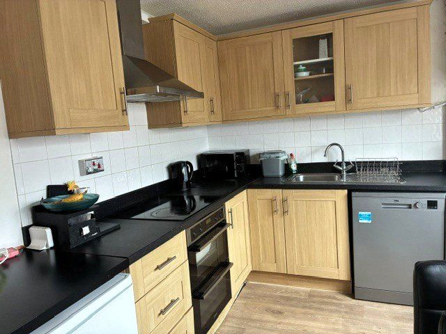 Property photo 3 of 8 Kitchen