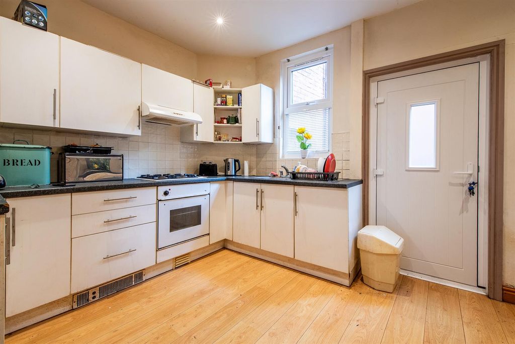 Property photo 3 of 13 Kitchen