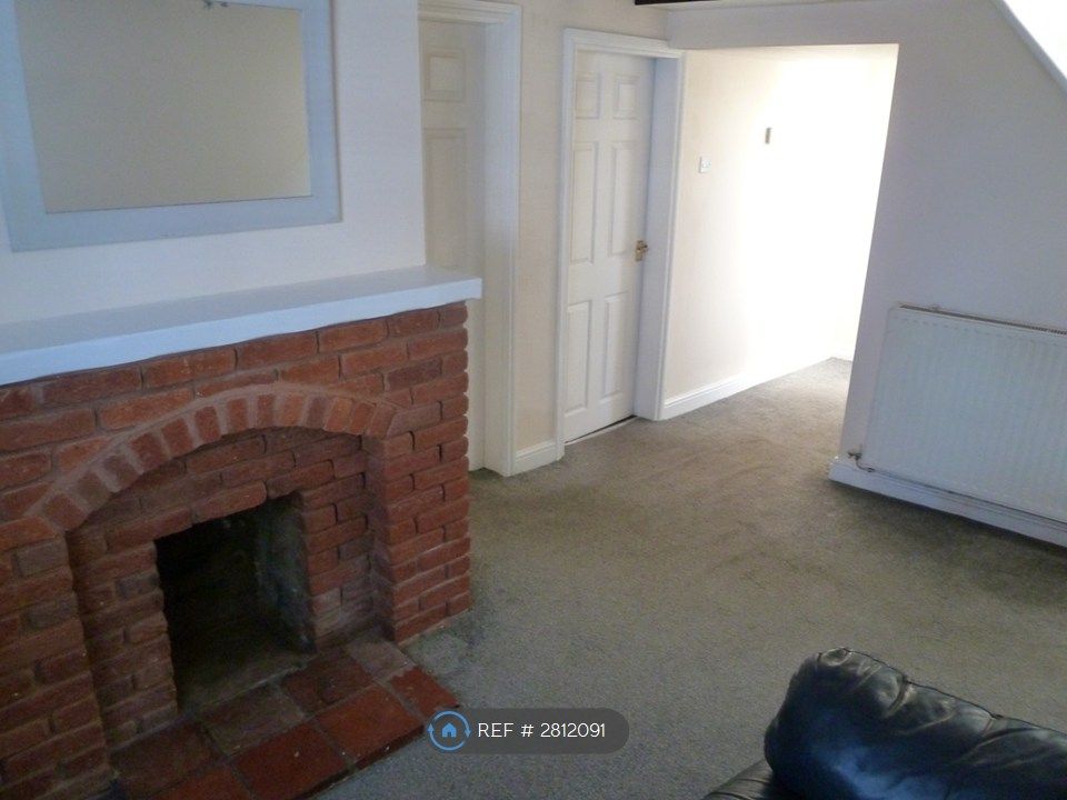 Property photo 3 of 10 Loung Area With Settee And Central Heating