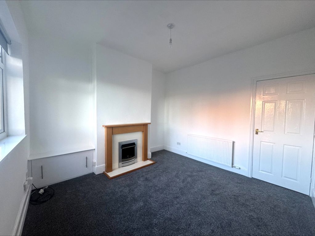 Property photo 3 of 12 Living Room