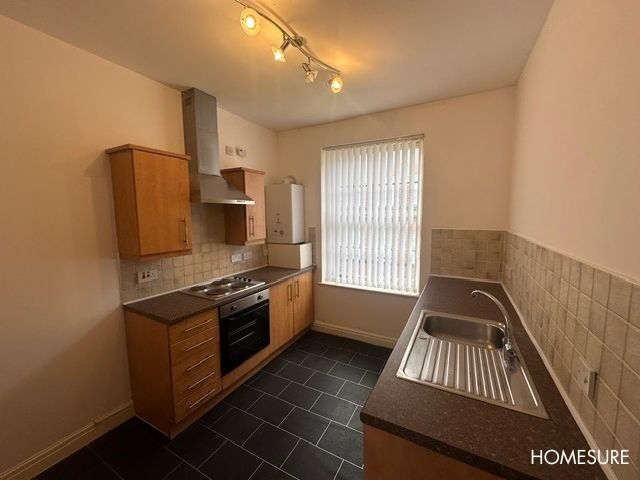 Property photo 3 of 6 Kitchen