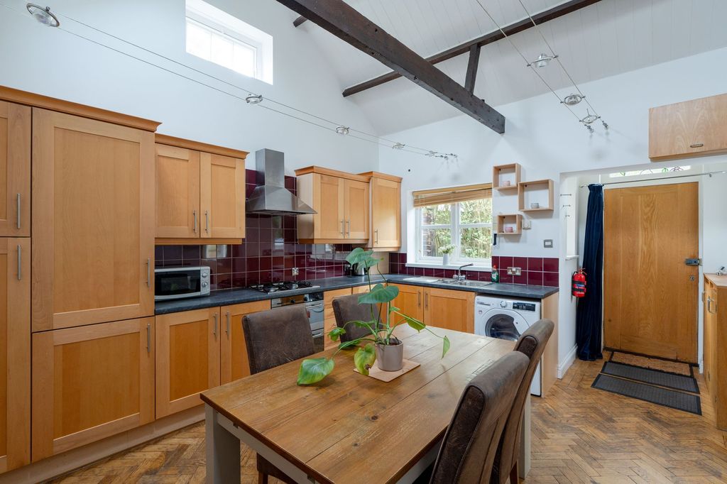 Property photo 3 of 11 Kitchen