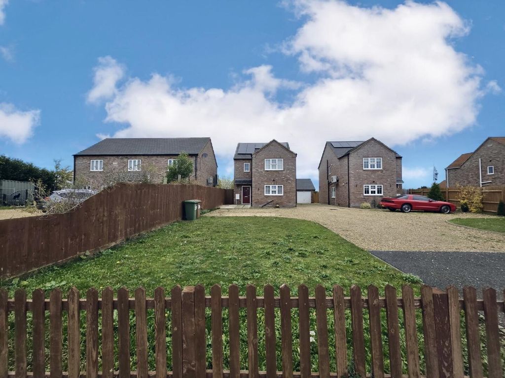 Property photo 1 of 15 Front (Exterior)