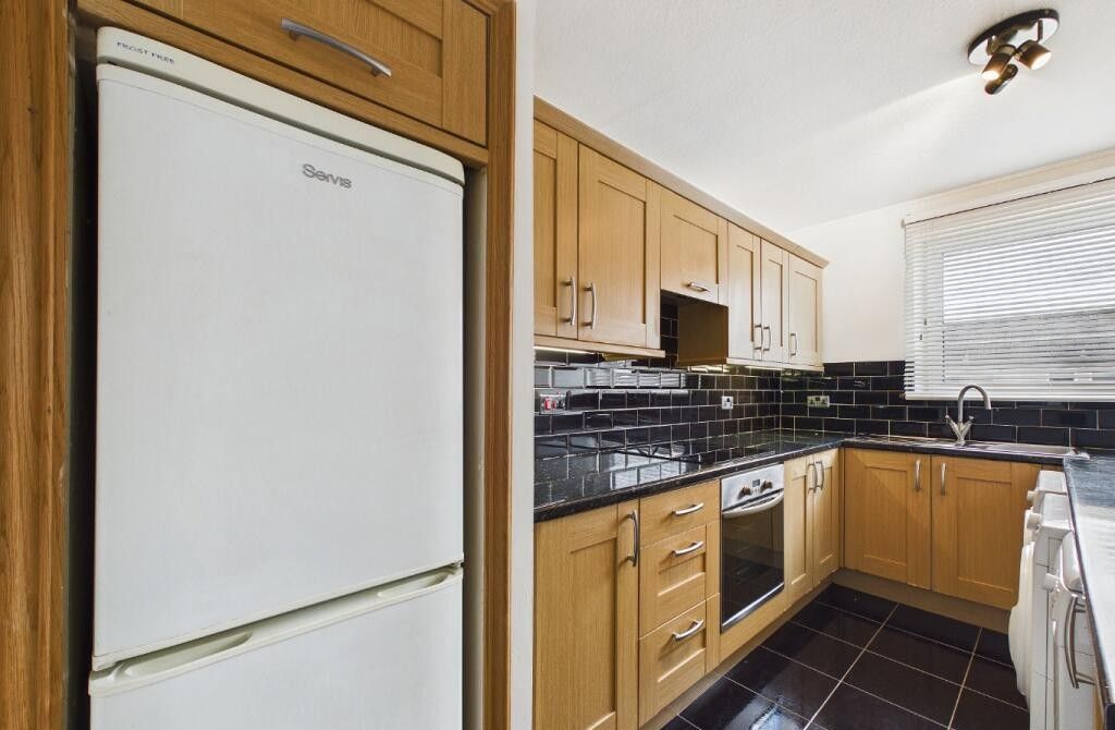Property photo 3 of 13 Kitchen